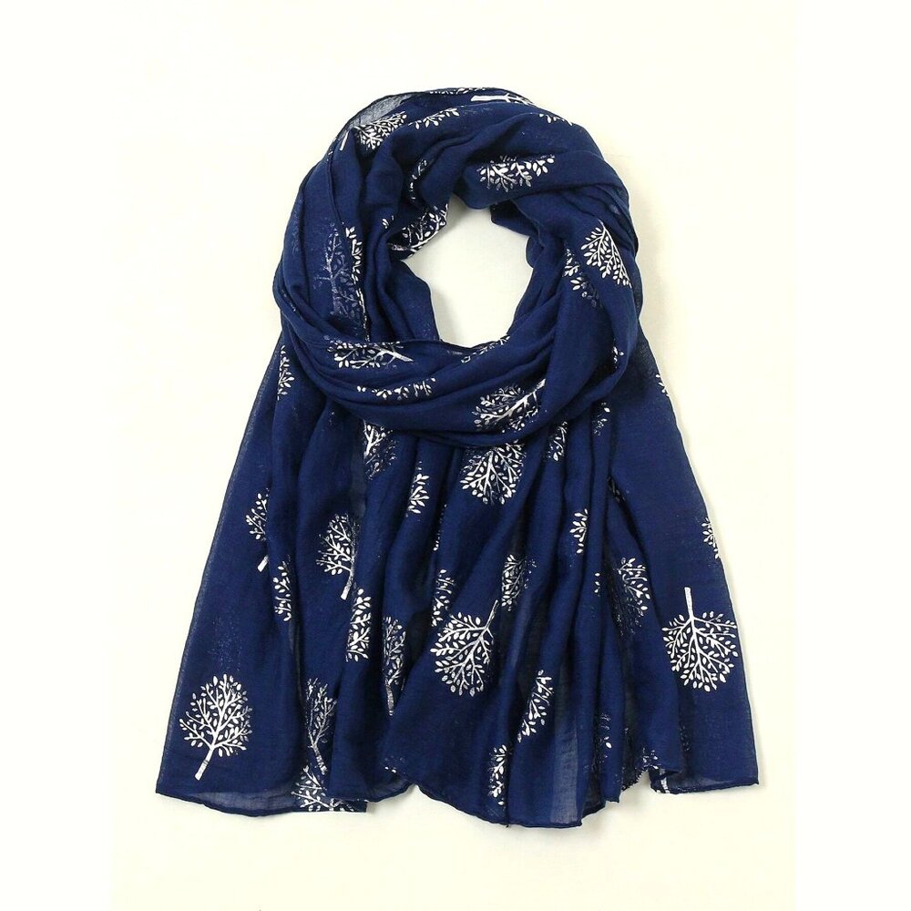 Elegant Luxurious scarf or wrap features a sophisticated 3D leaf pattern